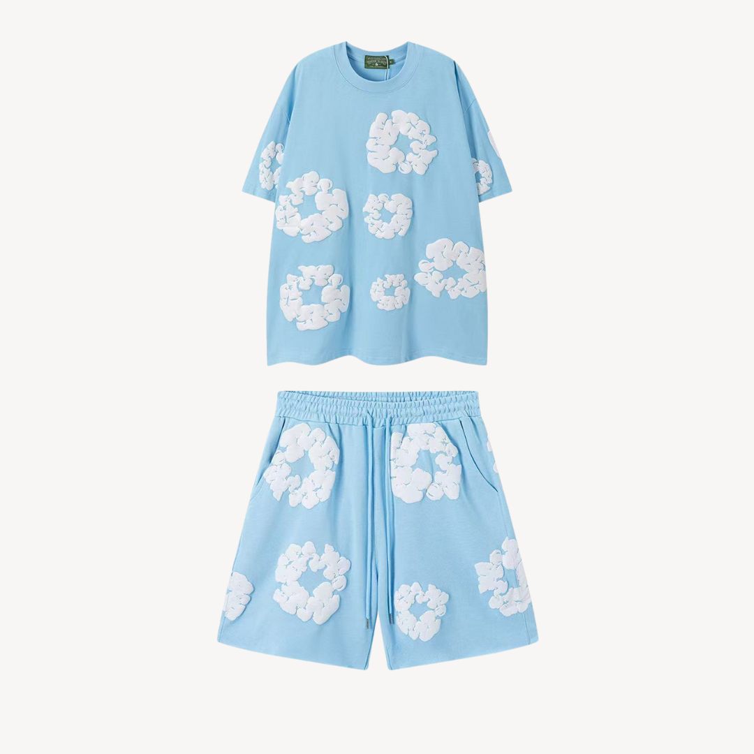 Relaxed fit floral tee & shorts loungewear set. Comfortable unisex casual wear for everyday style.
