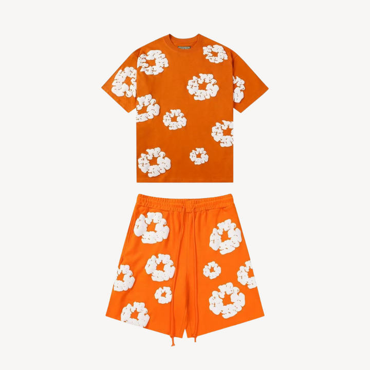 Coordinated unisex floral tee and shorts set. Stylish vibrant print for a comfortable summer outfit.