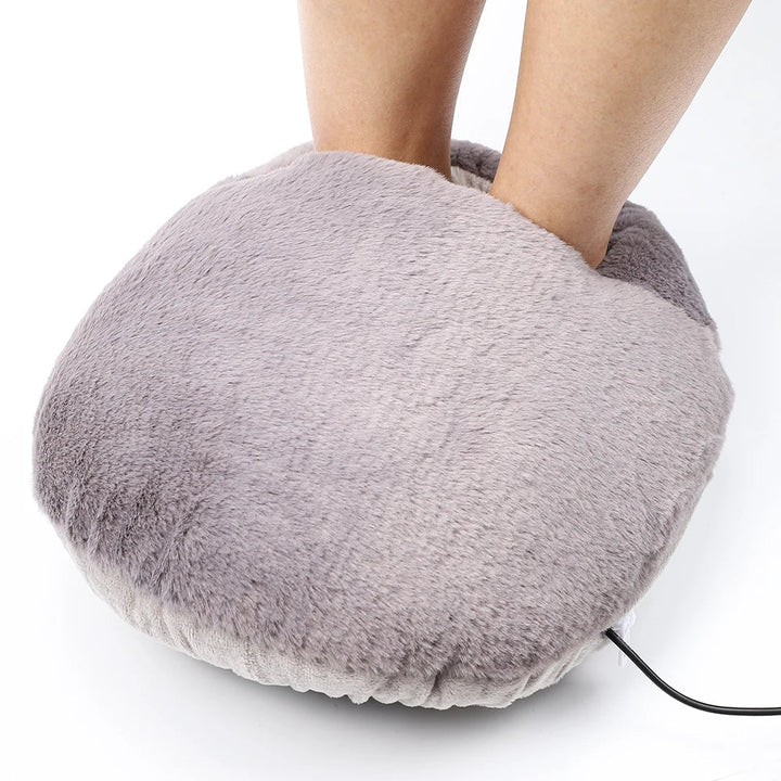 Soft electric foot warmer cushion with plush fluffy material for soothing warmth & cozy relaxation.