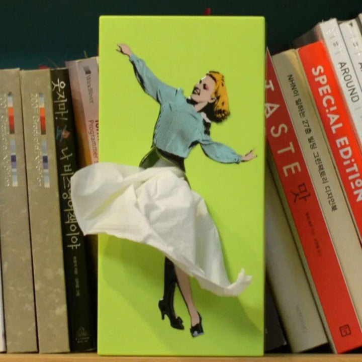 Whimsical 'flying skirt' design tissue box. A decorative and unique unisex home decor novelty gift.