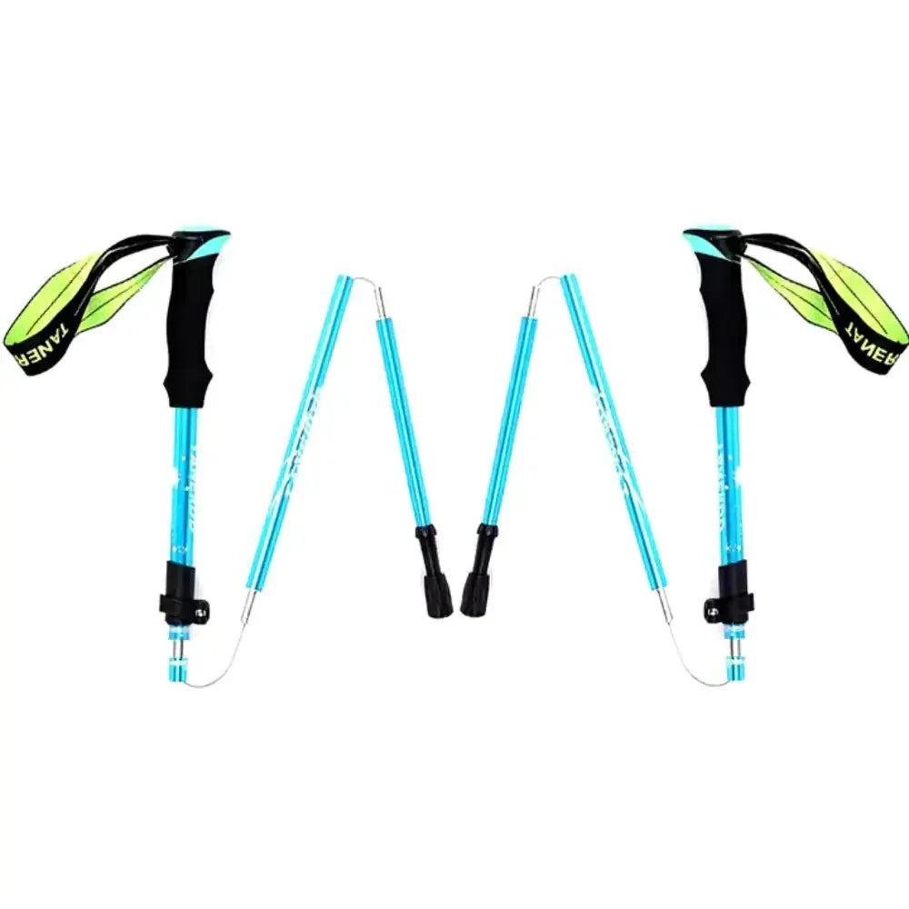 Sturdy tip of an aluminum trekking pole, designed for various terrains on outdoor trails.
