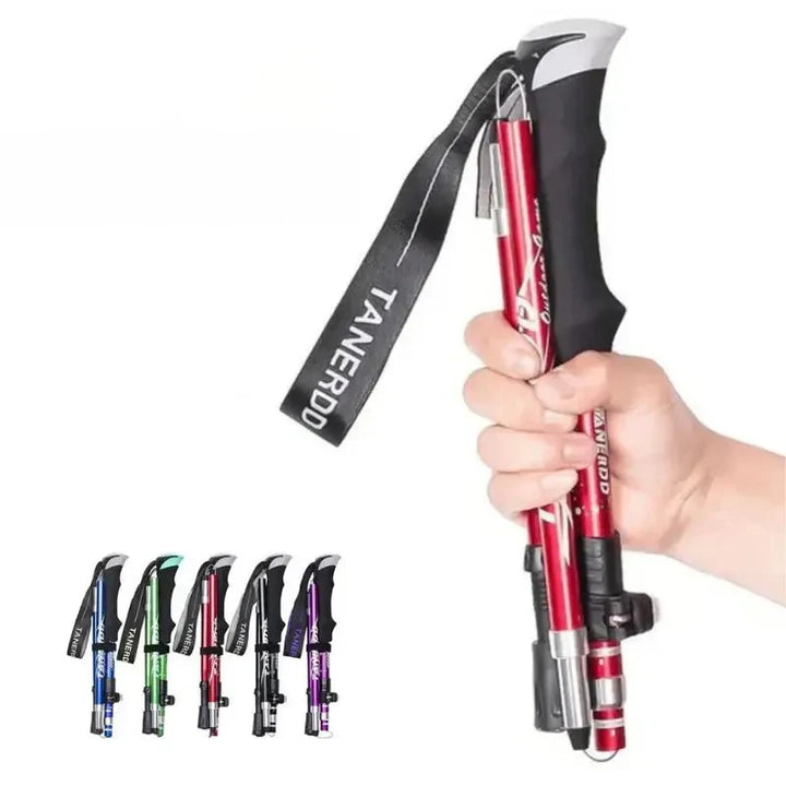 Showcasing the easy folding mechanism of a lightweight aluminum hiking pole.