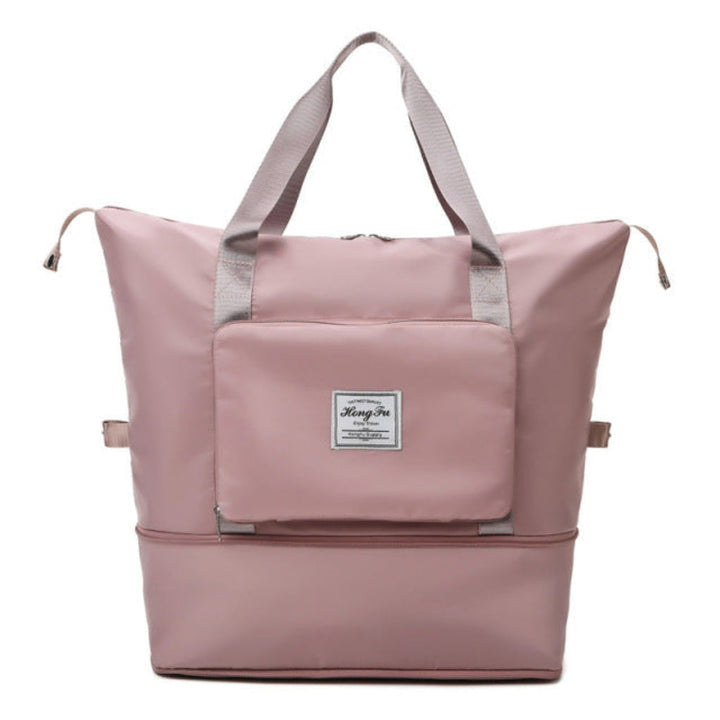 Spacious foldable travel duffle, a lightweight carry-on bag for weekend getaways, compact when stored.