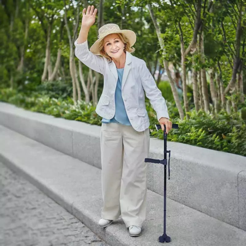 LED illuminated foldable walking cane with non-slip base for safe night walks. Portable mobility aid for security.