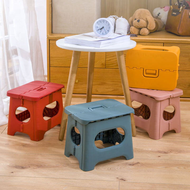 Durable folding step stool for kids, non-slip surface ensures safety in bathroom or kitchen.