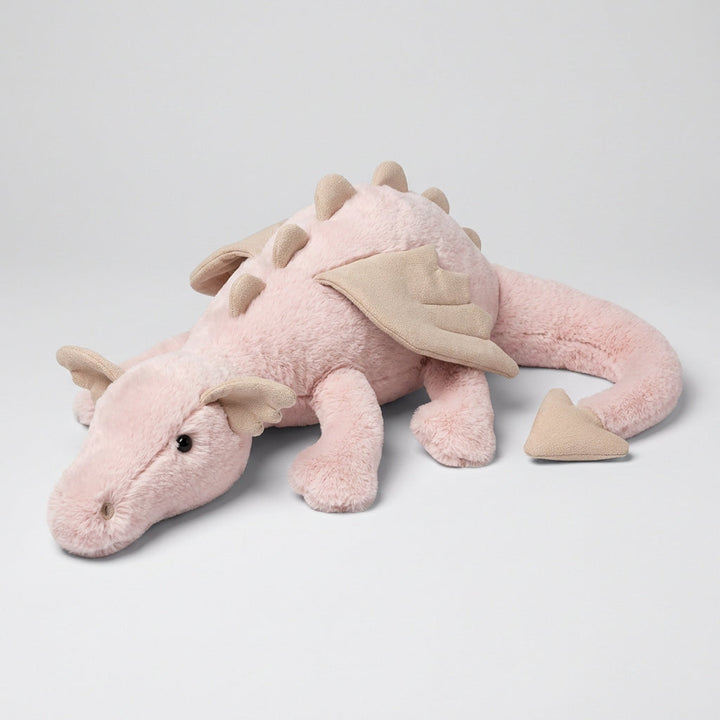 Friendly dragon plush toy, a cute and soft stuffed animal, perfect for kids' imaginative adventures and bedroom decor.