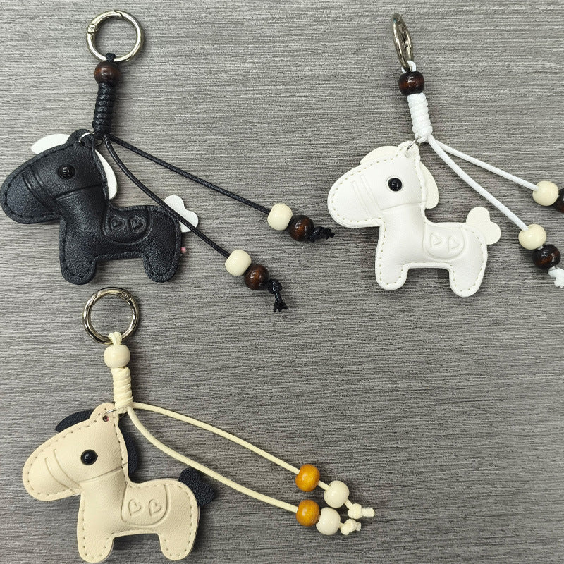 Unisex genuine leather horse keychain, a stylish animal accessory perfect for keys or bags.