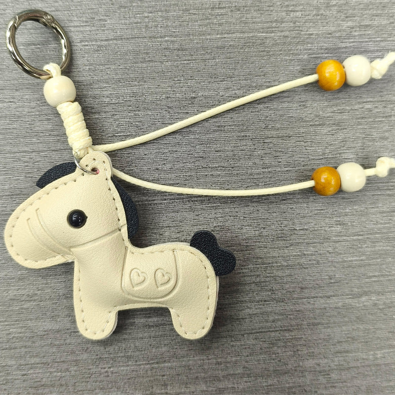 Genuine leather horse animal charm, a durable and stylish unisex keychain accessory.