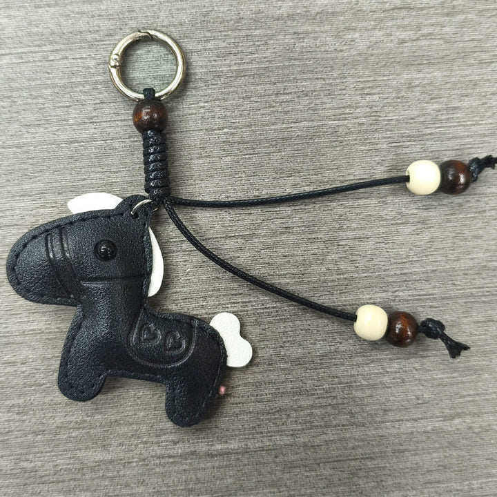 Durable genuine leather horse charm, a stylish and unique unisex accessory for keys or bags.