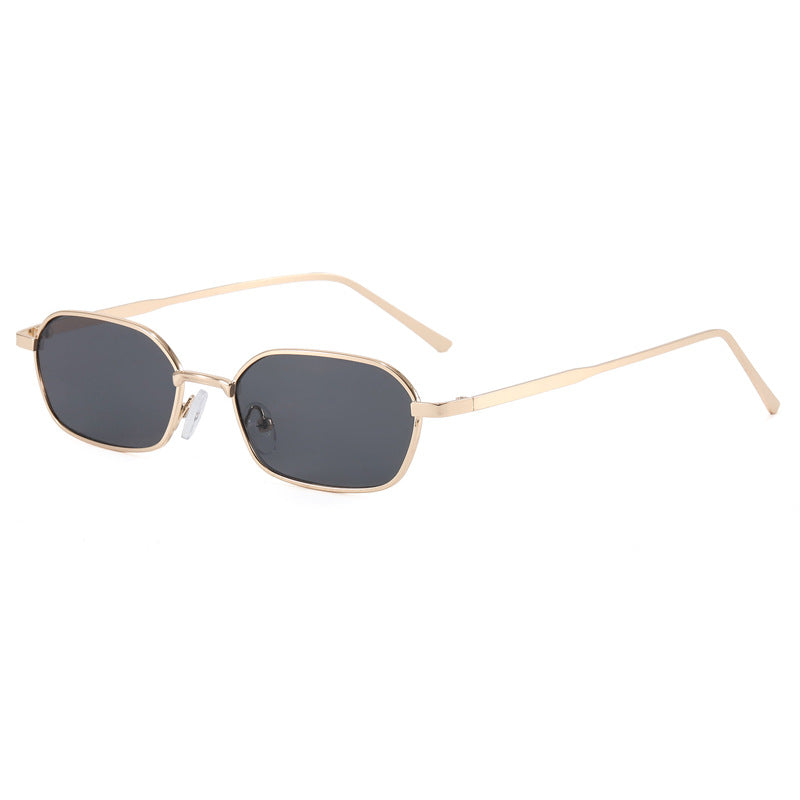 Lightweight geometric sunglasses, a modern unisex eyewear piece. Offers superior UV protection, designer style.
