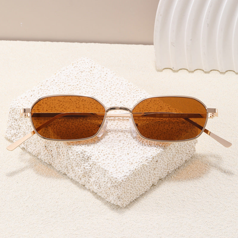 Designer geometric sunglasses with modern lines. Unisex UV protection eyewear, perfect lightweight fashion accessory.