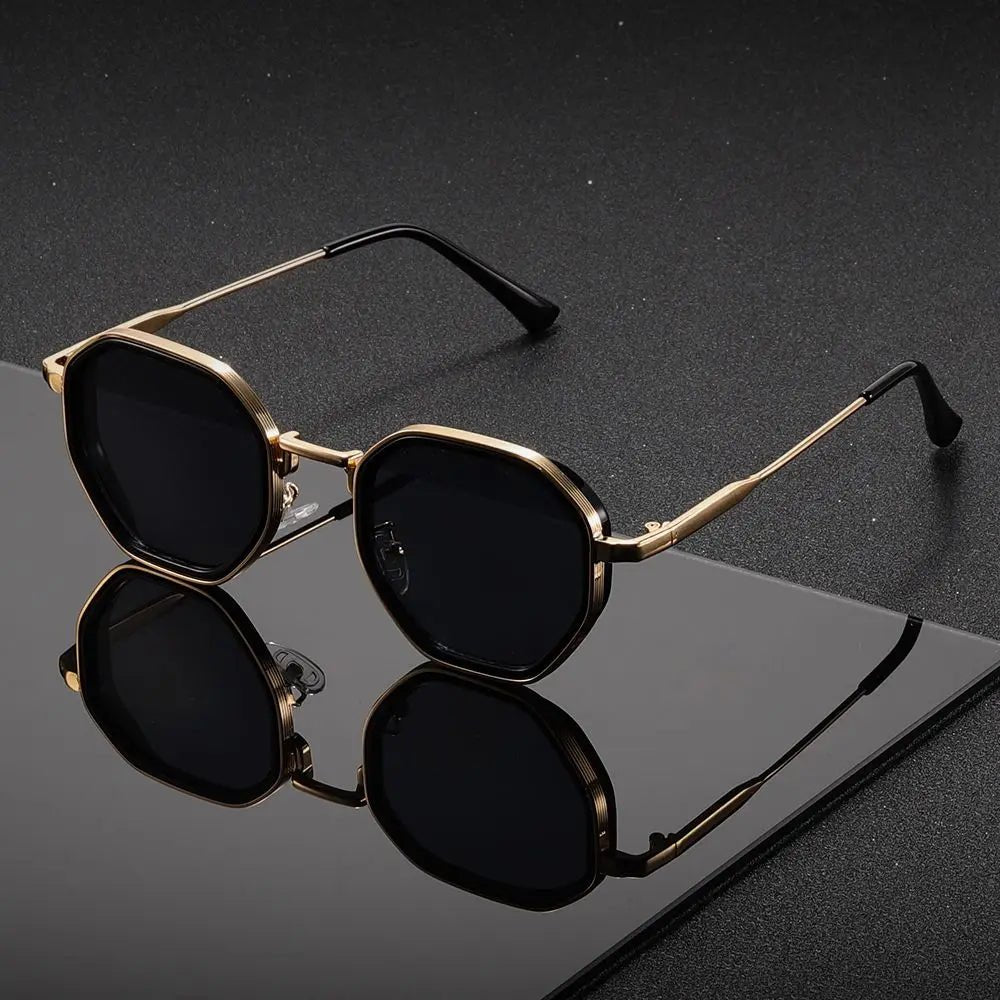 Modern geometric tortoiseshell sunglasses, unisex design with gradient lenses for fashion-forward eye protection.