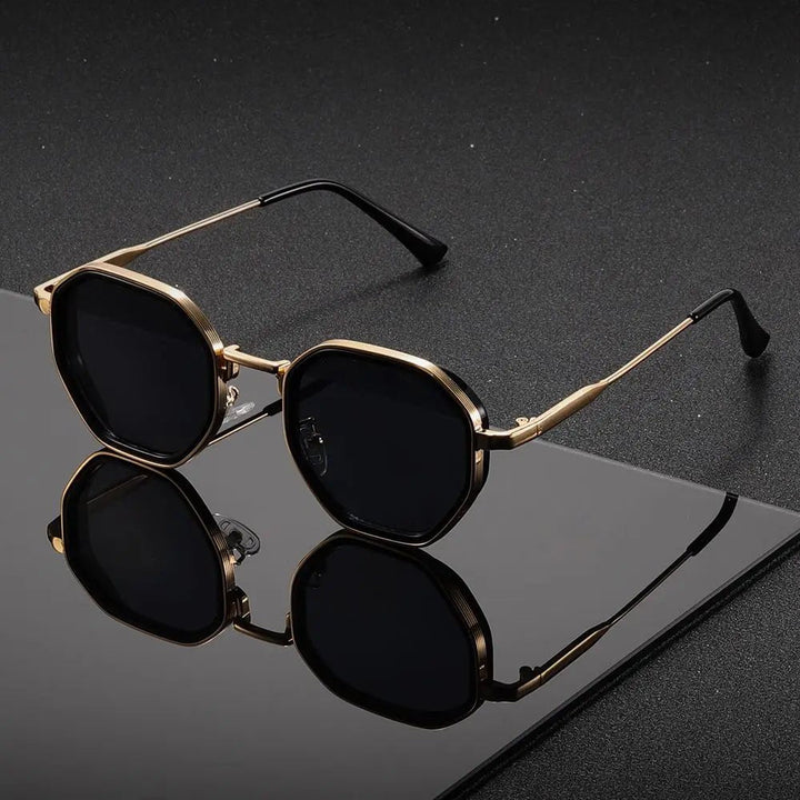 Modern geometric tortoiseshell sunglasses, unisex design with gradient lenses for fashion-forward eye protection.