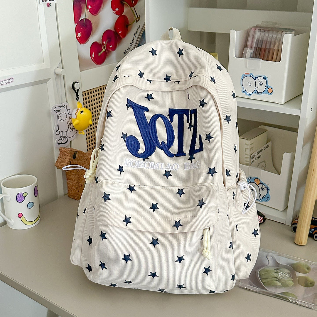 Stylish casual daypack featuring a unique star graphic print. Perfect for daily adventures.