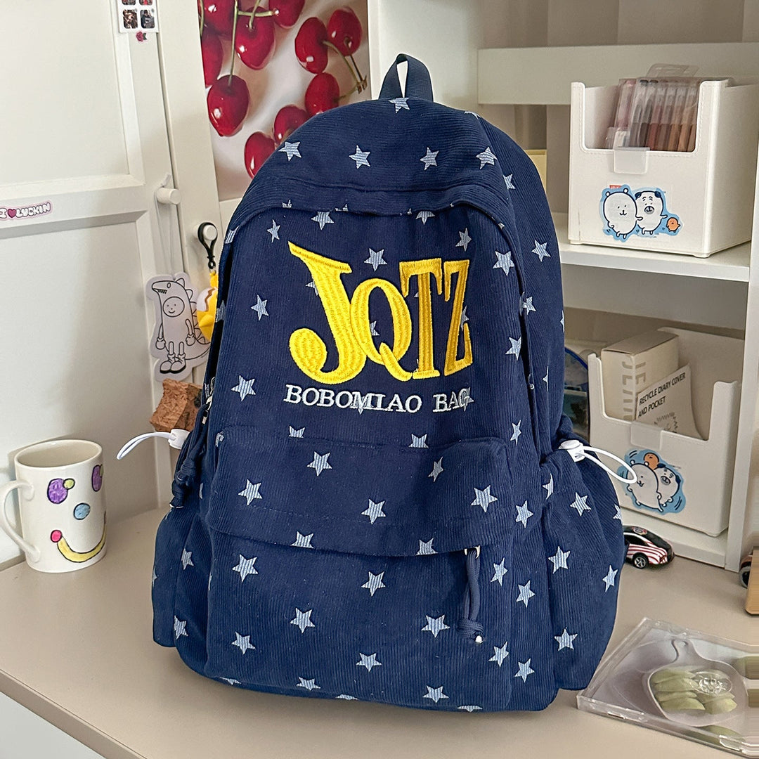 Printed unisex school bag, a versatile and trendy star-patterned backpack for students and travelers.