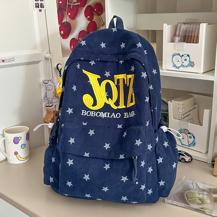 Printed unisex school bag, a versatile and trendy star-patterned backpack for students and travelers.