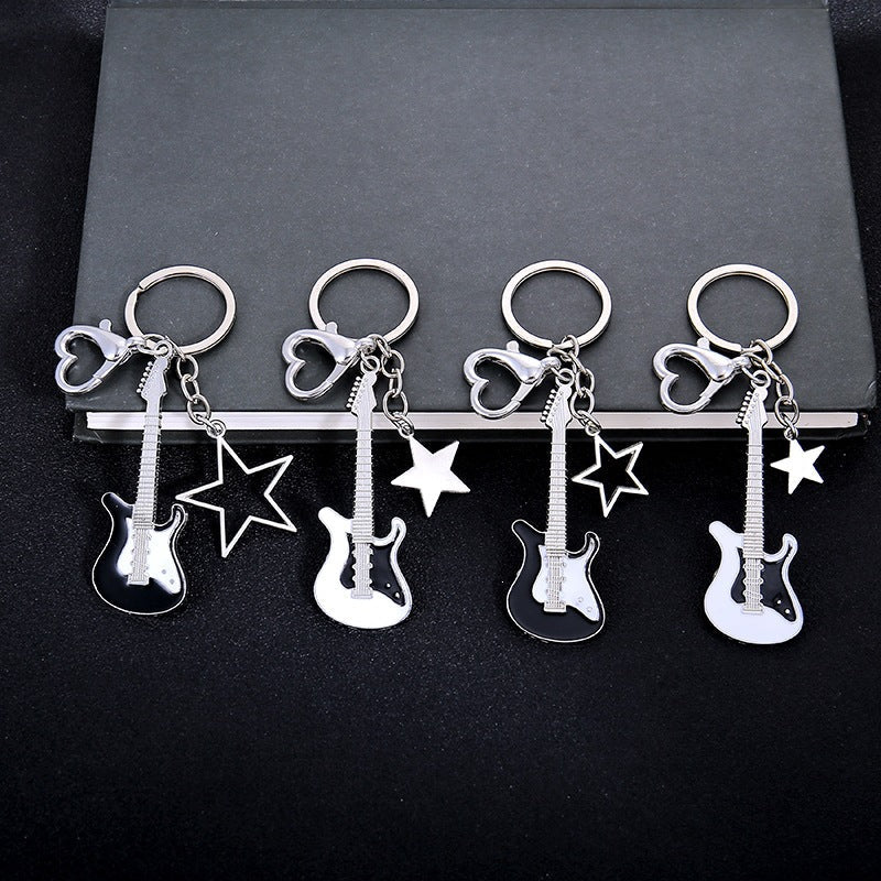 Unisex guitar keychain, a perfect musical gift & key holder for music lovers and musicians.