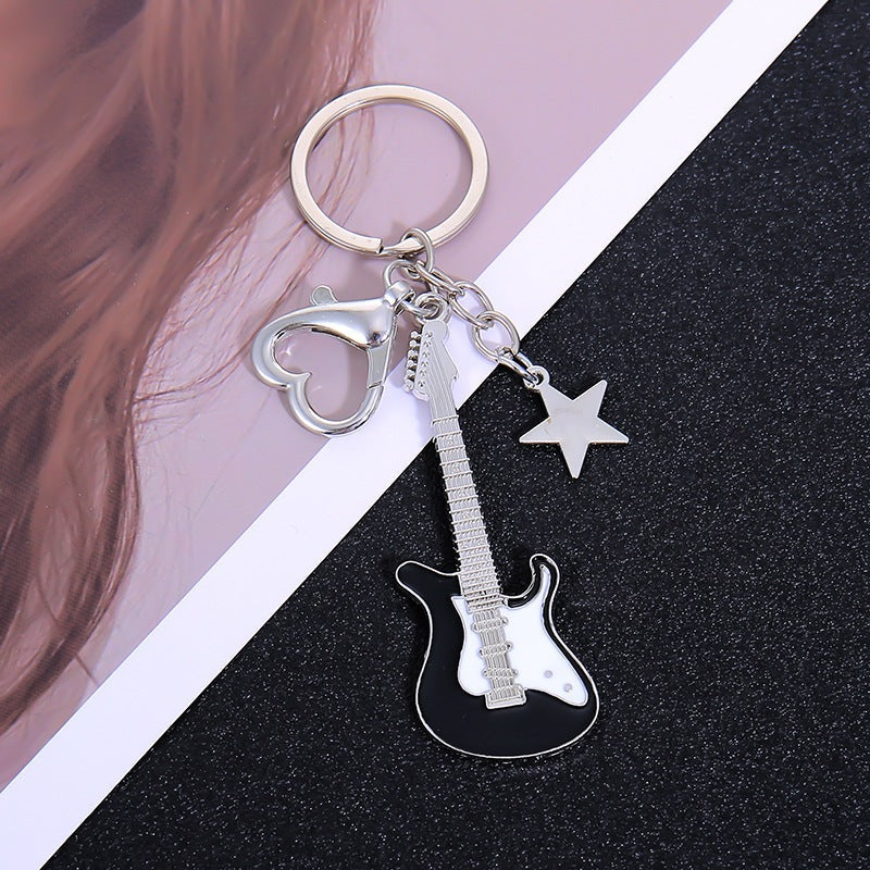 Classic guitar design keychain, perfect musical gift for any music lover or enthusiast.