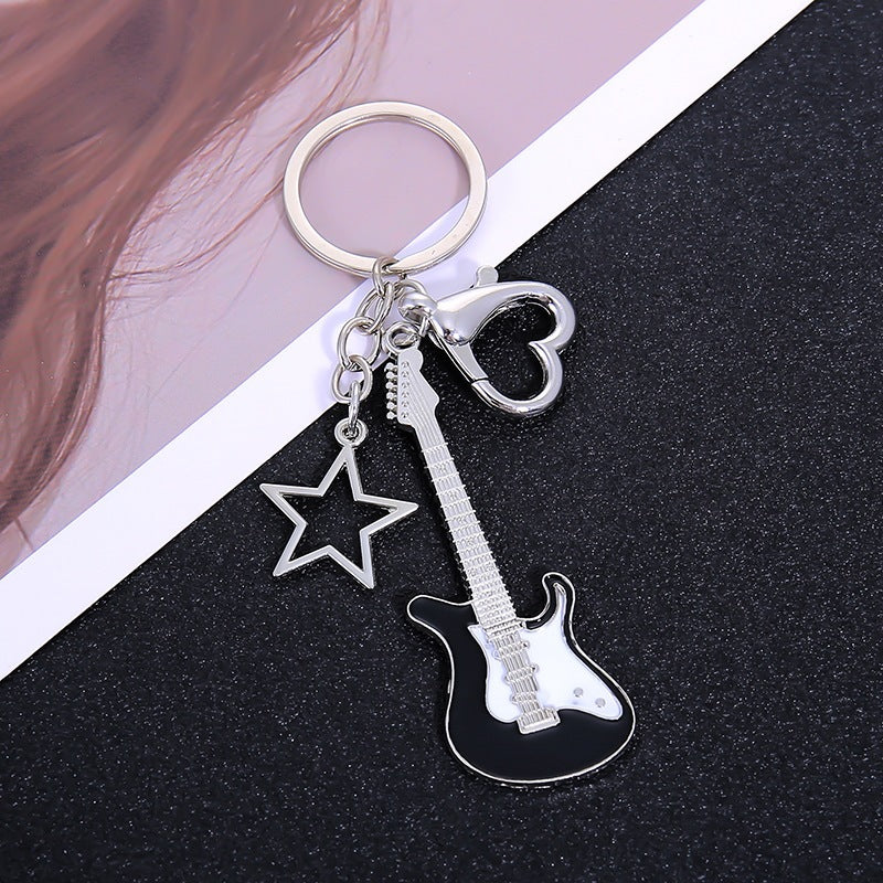 Intricate guitar keychain, a thoughtful musical gift & key holder for all guitar players.