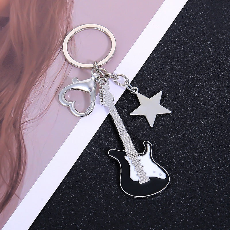 Fun guitar music accessory key holder, keeps your keys secure and adds a musical flair.