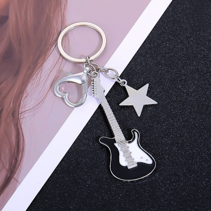 Fun guitar music accessory key holder, keeps your keys secure and adds a musical flair.