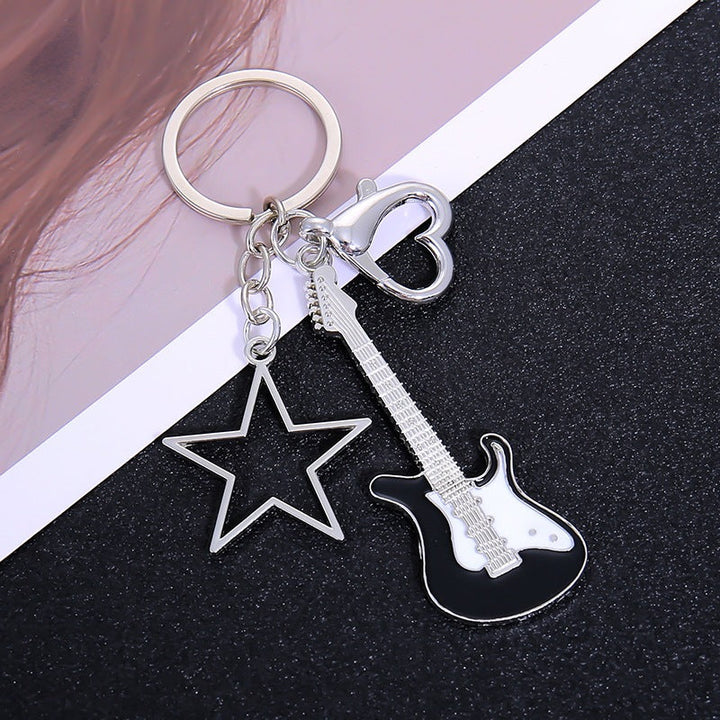 Bold guitar design metal keychain, a statement piece and must-have for all music lovers.