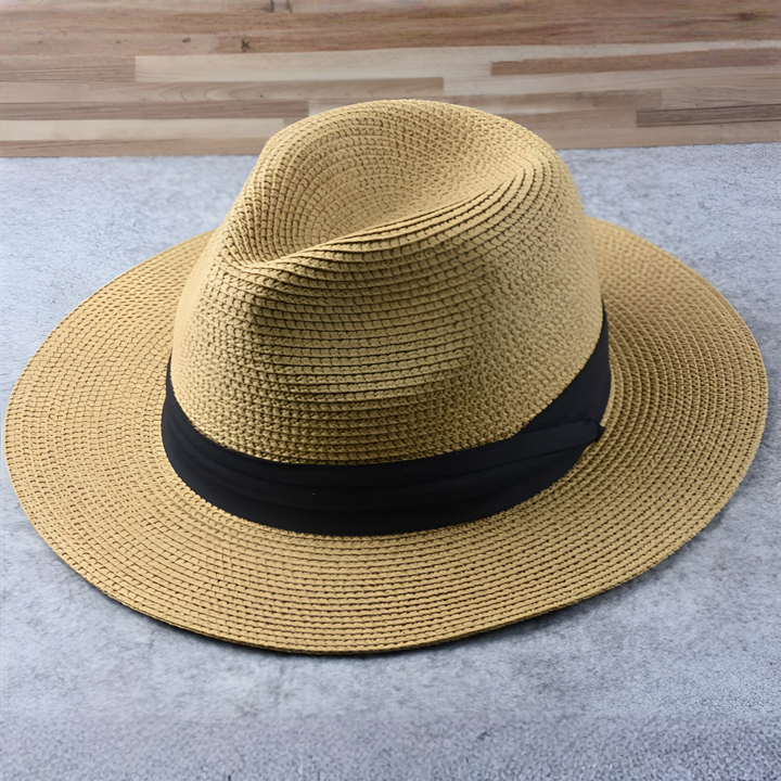 Handcrafted wide-brim Panama straw hat, lightweight toquilla material, unisex, perfect for stylish sun protection.