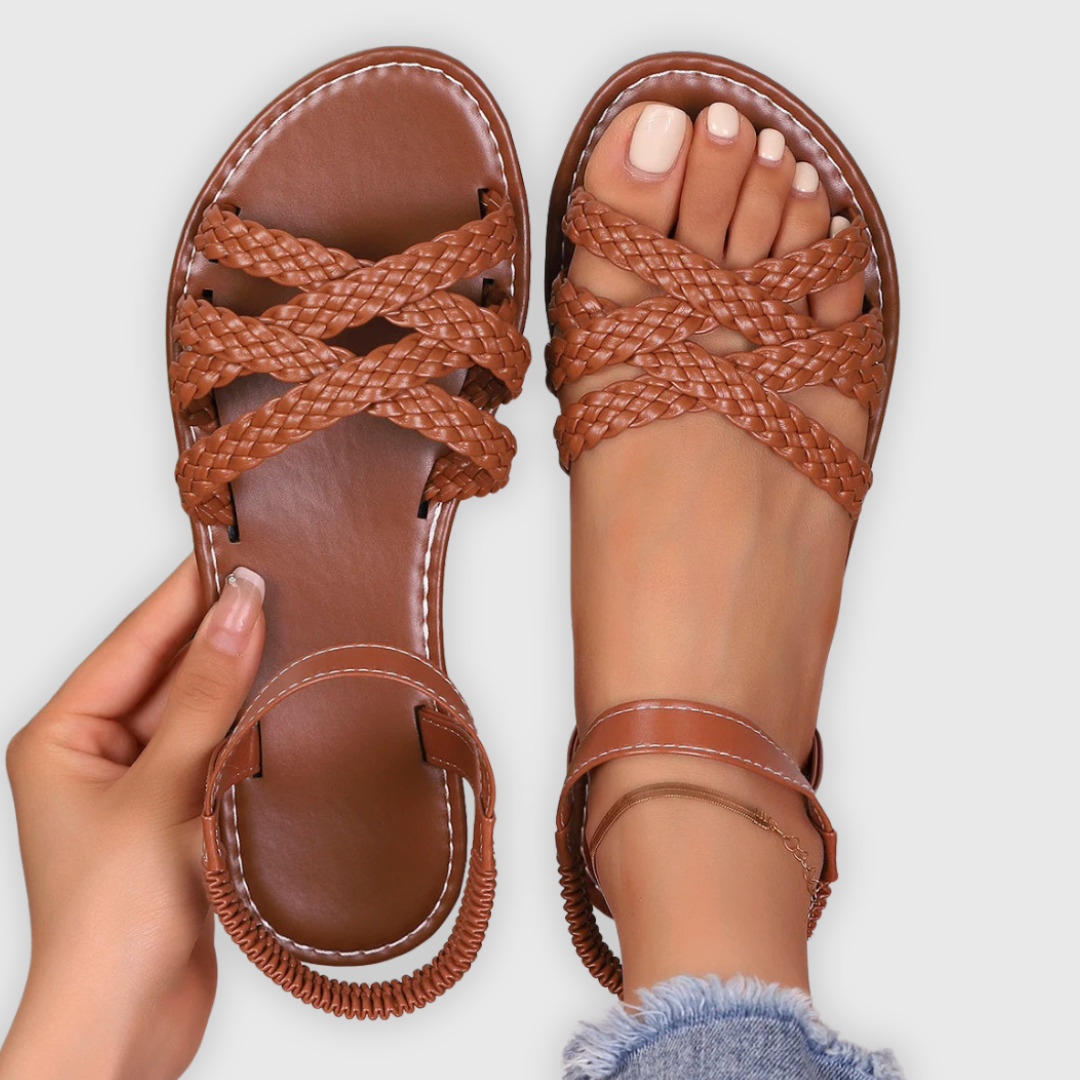 Close-up of comfortable unisex handmade sandals, showcasing craftsmanship & stylish design for summer beachwear.