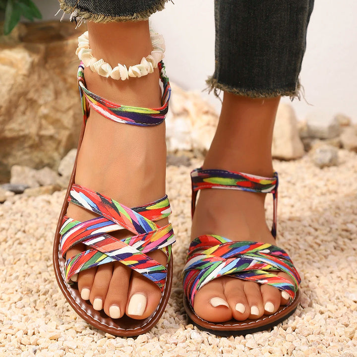 Pair of versatile unisex summer sandals, handmade for comfort and style, perfect for beach days or casual travel.