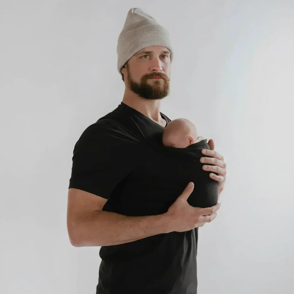Simple unisex hands-free baby carrier shirt with integrated pouch for easy, close contact with your newborn.