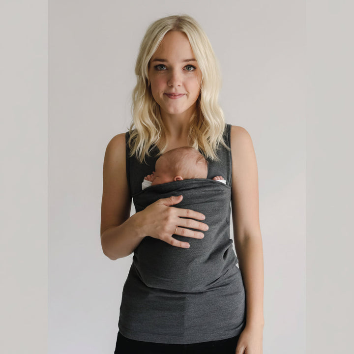 Modern hands-free unisex baby carrier shirt for new parents. Integrated pouch supports newborns & infants.