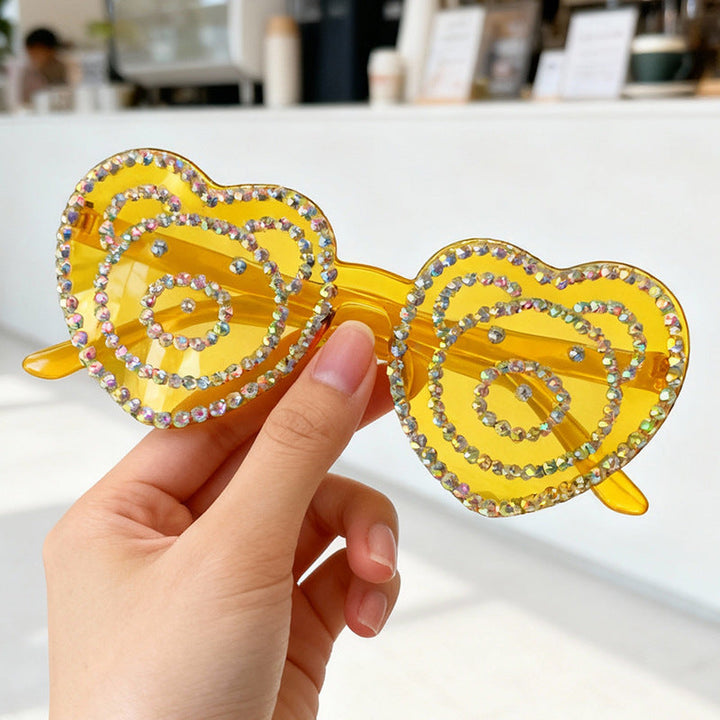 Eye-catching heart rhinestone sunglasses, essential for festival and party outfits.