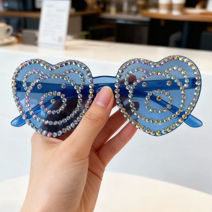 Unique heart-shaped rhinestone sunglasses, perfect for festival & summer style.