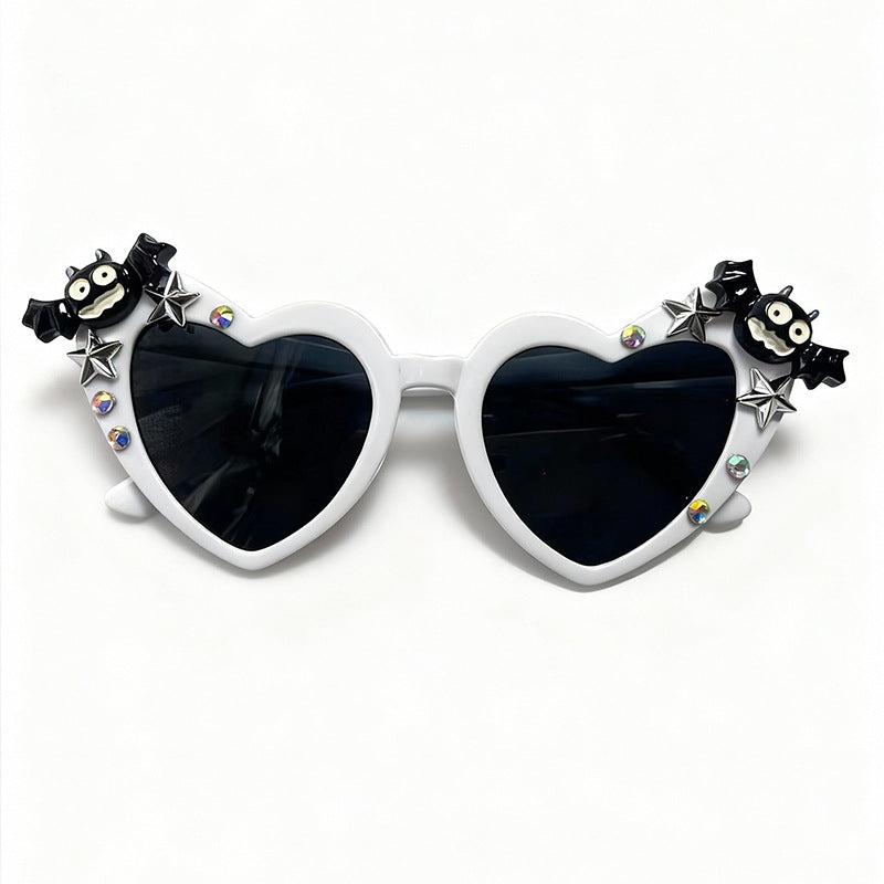 Fashionable heart sunglasses with UV protection. Fun pink eyewear for festivals, parties & unique style.