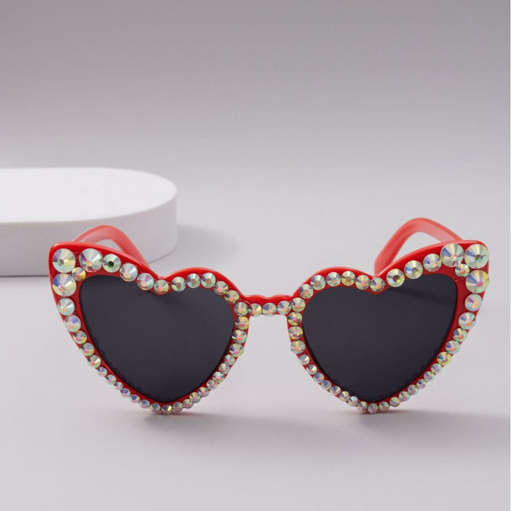 Unisex heart-shaped rhinestone sunglasses, trendy fashion eyewear with UV protection.