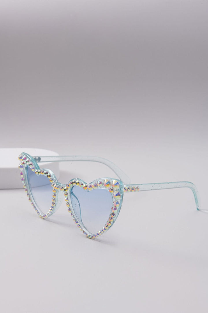 Trendy heart-shaped rhinestone shades for fashionable eye protection and summer glam.