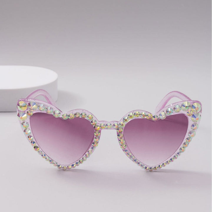 Fashionable heart rhinestone sunglasses offering stylish eye protection & UV defense.