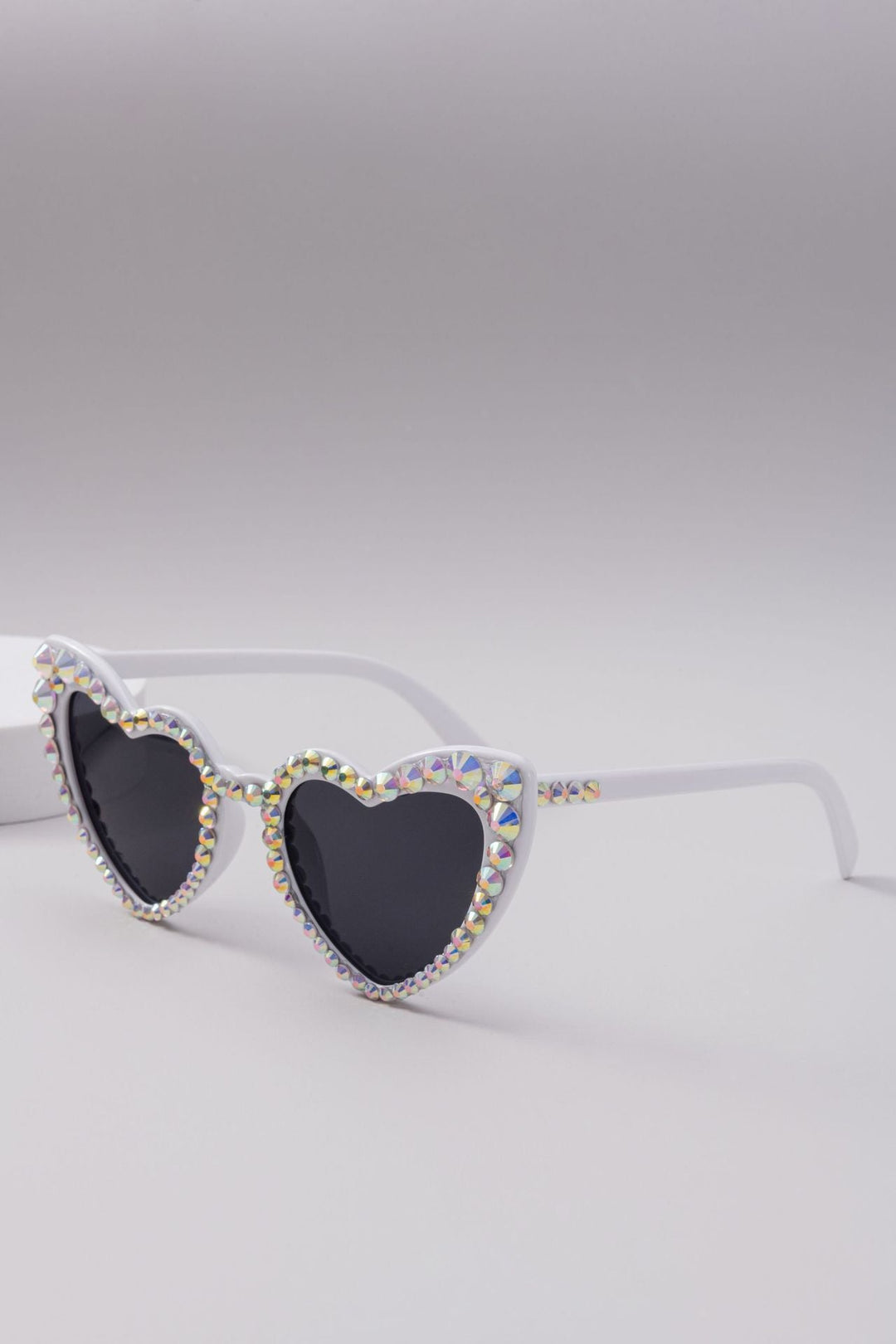 Dazzling rhinestone heart sunglasses for a glamorous and trendy eyewear statement.