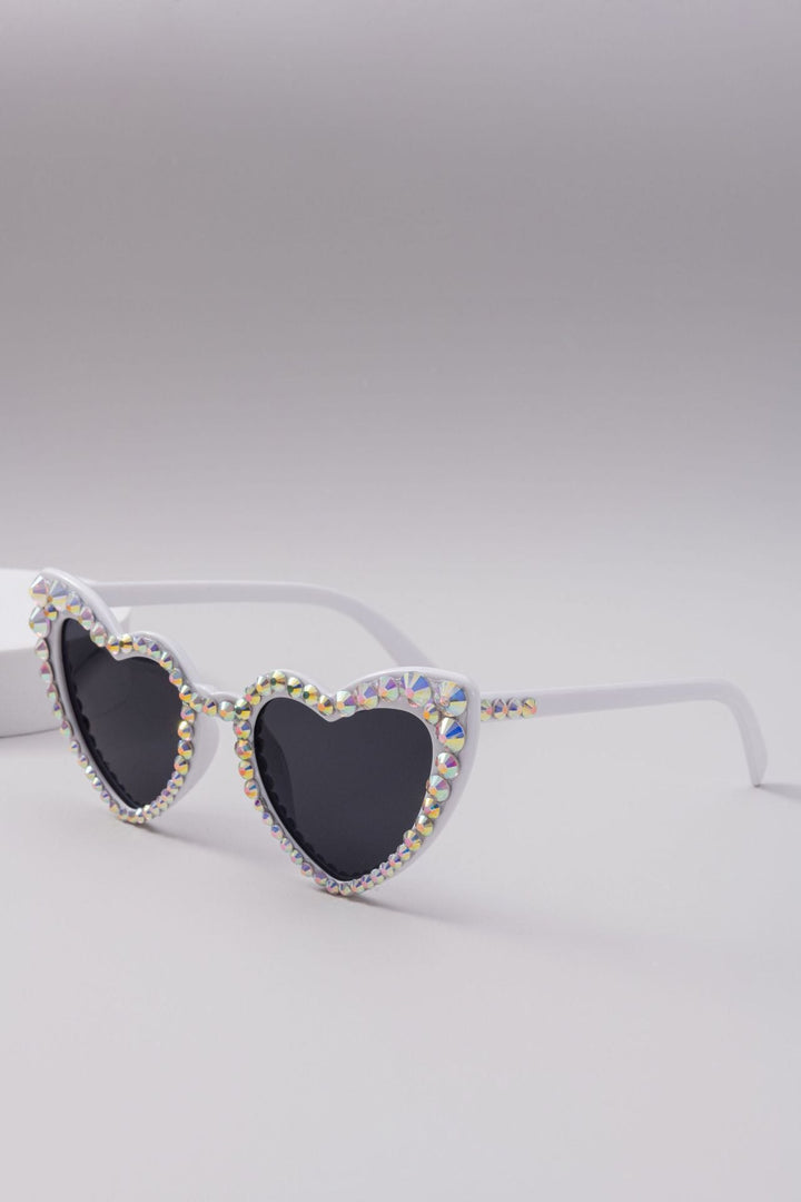 Dazzling rhinestone heart sunglasses for a glamorous and trendy eyewear statement.