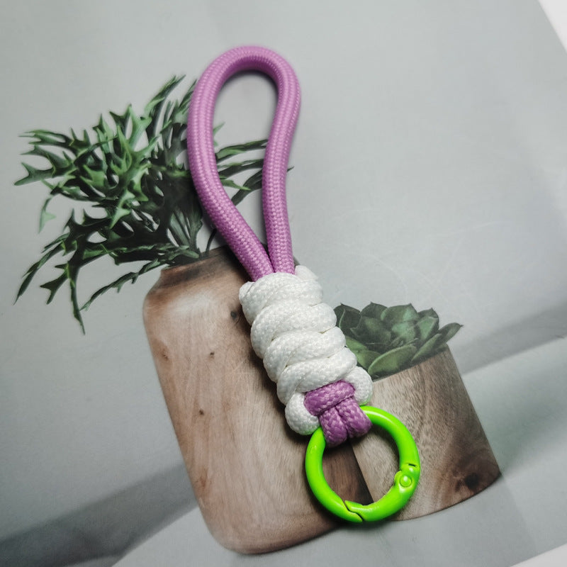 Multi-purpose paracord keychain, essential key holder for outdoor enthusiasts.