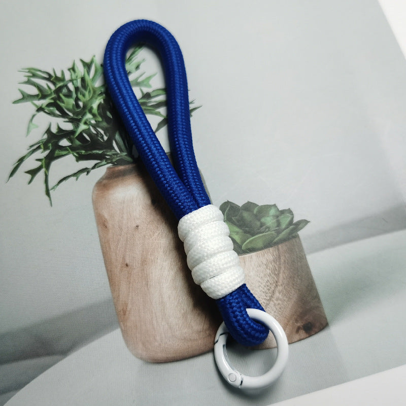 Stylish & durable paracord keychain holder, a reliable outdoor gear accessory.