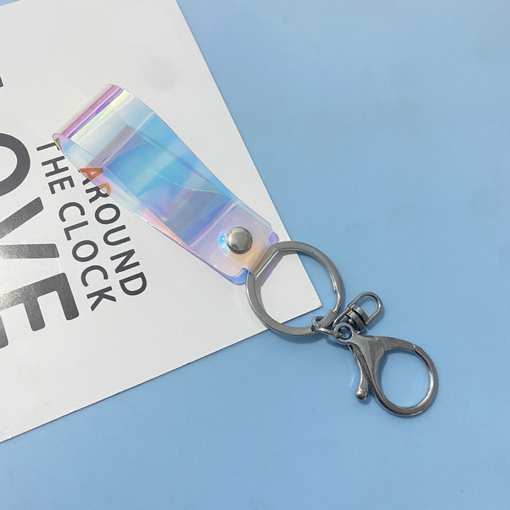 Bright holographic shimmer keychain, a durable unisex bag charm accessory that adds flair.