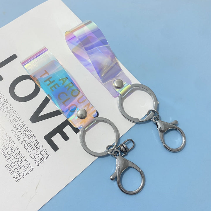 Durable unisex holographic keychain, a stylish and shimmering bag charm accessory.