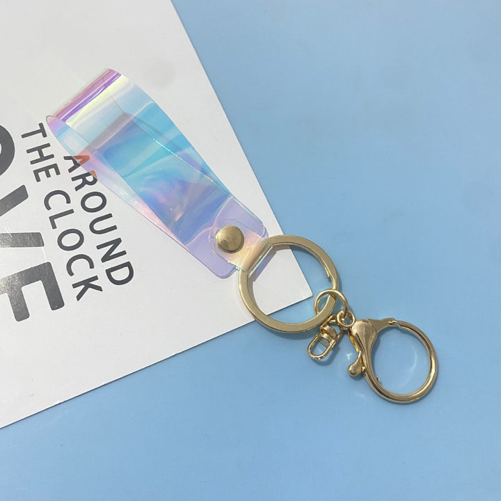 Unisex holographic keychain with vibrant shimmer, an attractive and durable bag charm accessory.