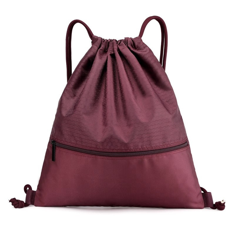 Modern unisex honeycomb drawstring travel bag, perfect for light packing and active lifestyles.
