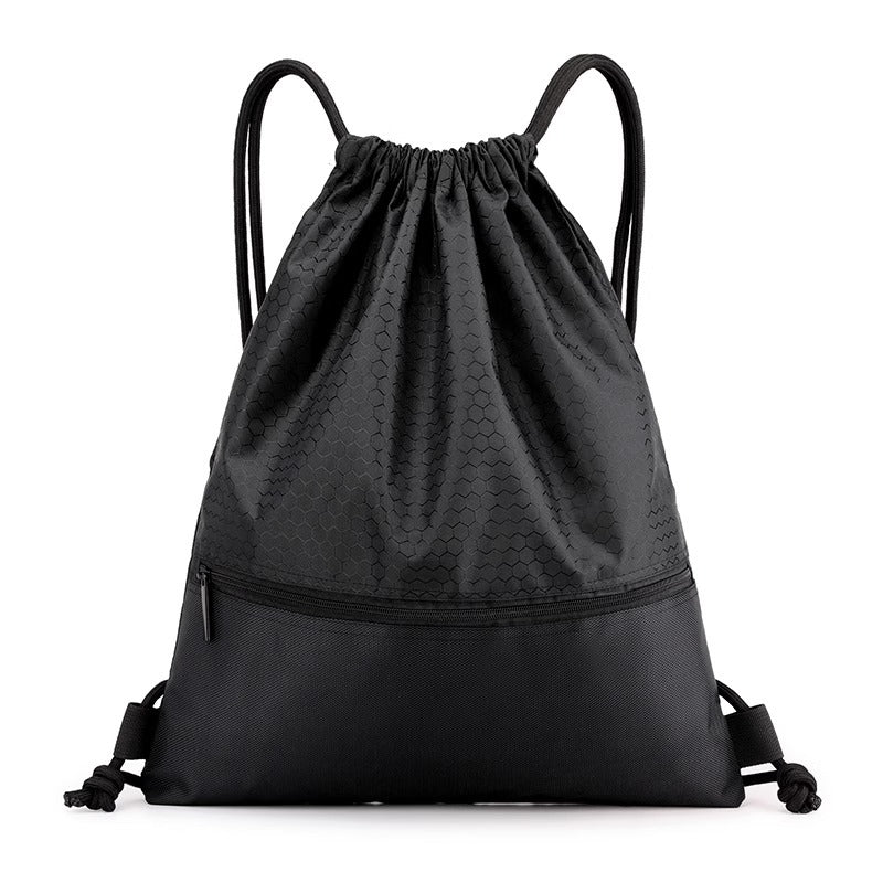 Spacious honeycomb drawstring bag with strong straps, designed for comfortable carrying gym items.