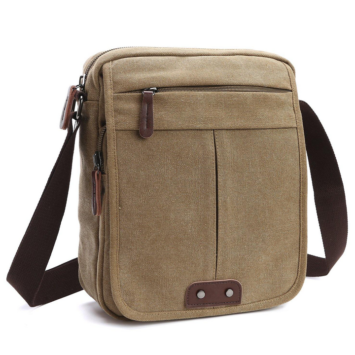 Versatile green canvas shoulder bag. Unisex crossbody perfect for everyday, travel, and keeping essentials organized.