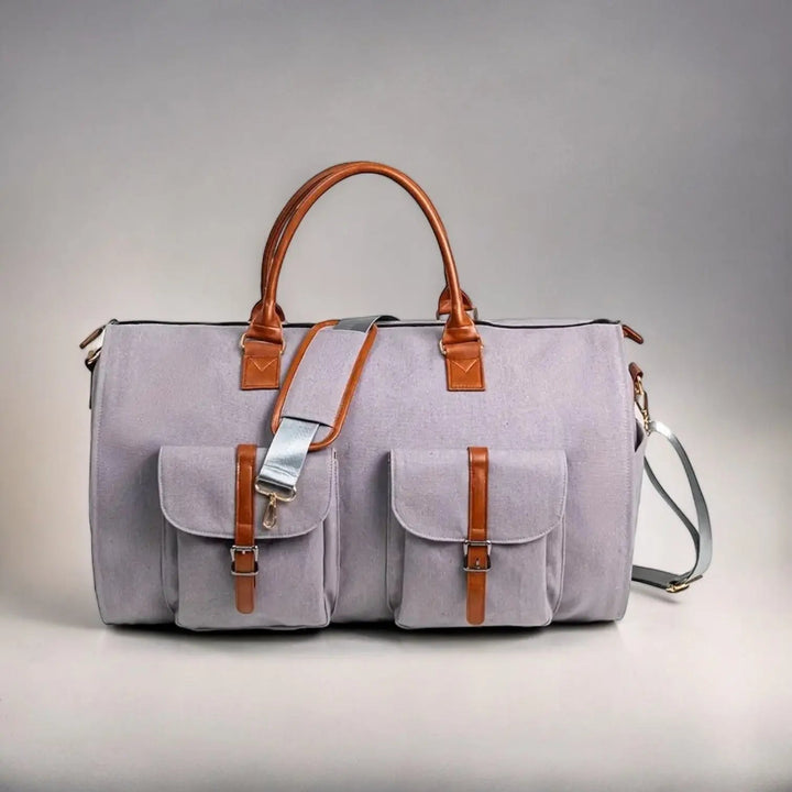 Premium water-resistant leather duffle for men & women. Transforms into a spacious garment bag.