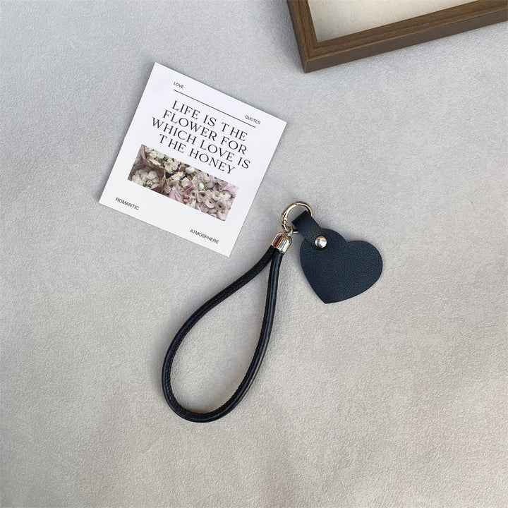 Functional leather heart key holder, durable & stylish for daily use.