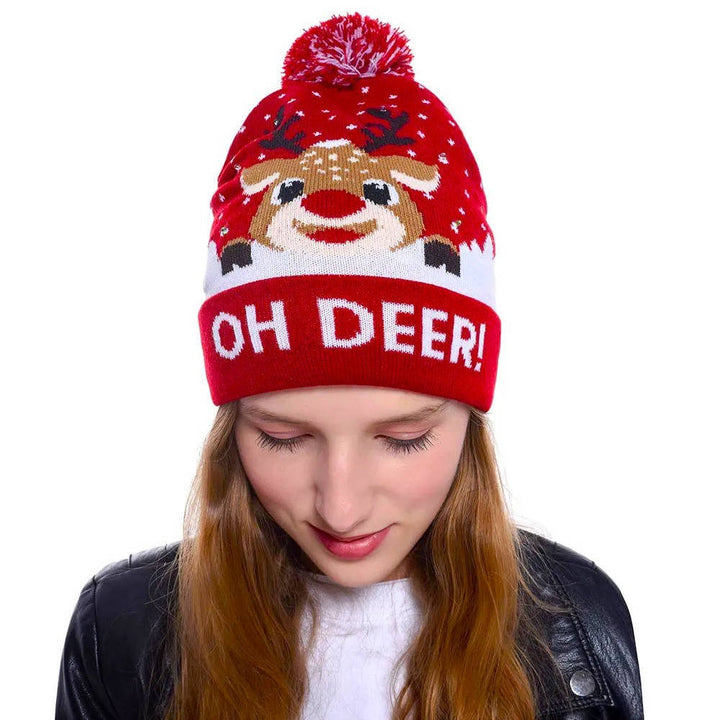 Bright LED light-up Christmas knit beanie. Unisex winter accessory with pompom, ideal for festive holiday parties.